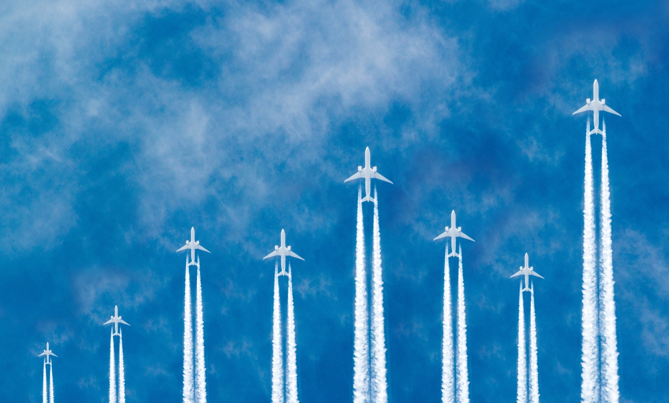 airplanes in the sky as a reminder that itcs provides cloud computing for the aviation industry